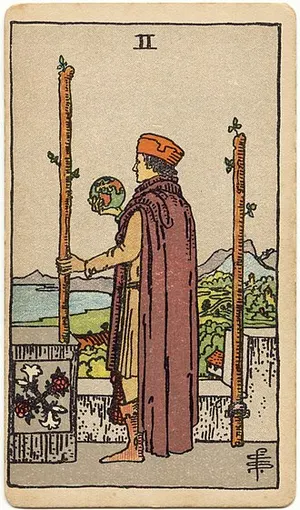 Two of Wands tarot card from the 1909 Rider–Waite–Smith deck
